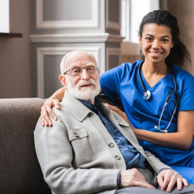 front-view-portrait-of-caring-afro-nurse-taking-care-of-an-elderly-caucasian-man-grandfather-1024x682.jpg